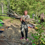 Liam showing us what it means to come back with an arm full of fire wood